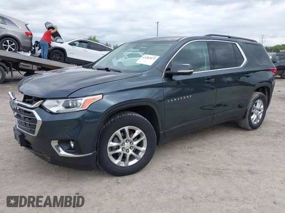 2019 Chevrolet Traverse LT Cloth z VIN 1GNEVMKW7KJ238111, wystawiony jako IAAI lot #43282872 z przebiegiem 122 571 mil mil oraz . Historia ofert i sprzedaży dostępna na DreamBid. Obrazek 2.