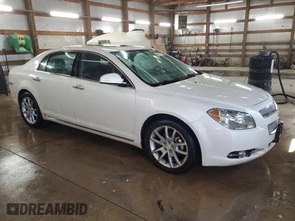 ✅ 2012 Chevrolet Malibu LTZ 1LZ • VIN: 1G1ZE5E00CF121944 • Lot: 77582084. Listed on Copart with 158,657 mi. Free auction sales archive from the USA and detailed vehicle history report at DreamBid. Image 4.