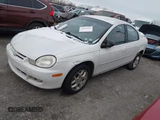 ✅ 2002 Dodge Neon ES • VIN: 1B3ES56C12D551971 • Lot: 43820328. Listed on IAAI with 220,000 mi. Free auction sales archive from the USA and detailed vehicle history report at DreamBid. Image 2.