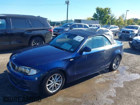✅ 2010 BMW 1 Series 128i • VIN: WBAUN1C59AVH81847 • Lot: 40496951. Listed on IAAI with 148,463 mi. Free auction sales archive from the USA and detailed vehicle history report at DreamBid. Image 2.