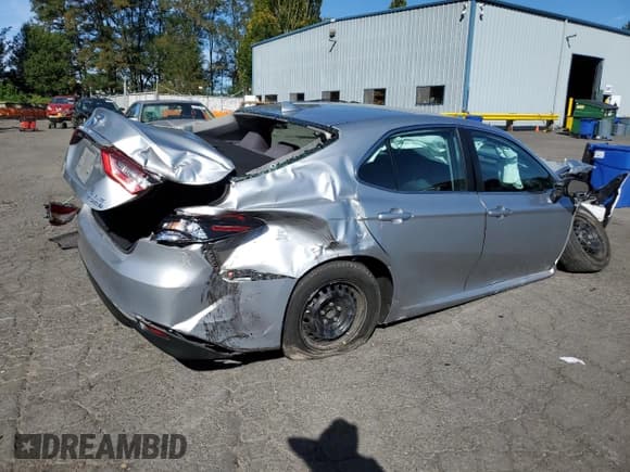 ✅ 2021 Toyota Camry Hybrid LE • VIN: 4T1C31AK5MU025786 • Лот: 84259505. Опубликован ранее на Copart с пробегом Не указан. Бесплатный доступ к архиву аукционных продаж из США и подробный отчёт об истории автомобиля на DreamBid. Изображение 2.
