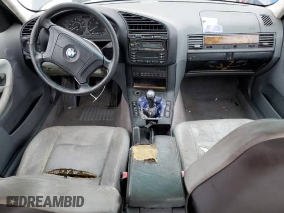 1997 BMW 3 Series z VIN WBACD3322VAV21297, wystawiony jako Copart lot #43254895 z przebiegiem Nie podano mil oraz Szkoda całkowita • Salvage title. Historia ofert i sprzedaży dostępna na DreamBid. Obrazek 8.