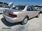 ✅ 1996 Toyota Camry LE • VIN: 4T1BF12K1TU139929 • Lot: 77194604. Listed on Copart with 161,410 mi. Free auction sales archive from the USA and detailed vehicle history report at DreamBid. Image 3.