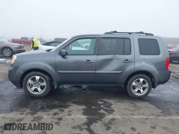 ✅ 2012 Honda Pilot EX-L • VIN: 5FNYF4H79CB003740 • Lot: 43812027. Listed on IAAI with 236,841 mi. Free auction sales archive from the USA and detailed vehicle history report at DreamBid. Image 14.