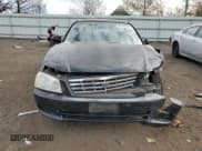 ✅ 2001 Kia Optima LX • VIN: KNAGD126315028712 • Lot: 85302564. Wystawiony na Copart z przebiegiem 81 722 mil. Bezpłatny archiwum sprzedaży aukcyjnych z USA i szczegółowy raport historii pojazdu na DreamBid. Zdjęcie 5.