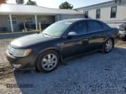 ✅ 2009 Ford Taurus Limited • VIN: 1FAHP25WX9G116517 • Lot: 64398285. Listed on Copart with 158,830 mi. Free auction sales archive from the USA and detailed vehicle history report at DreamBid. Image 1.