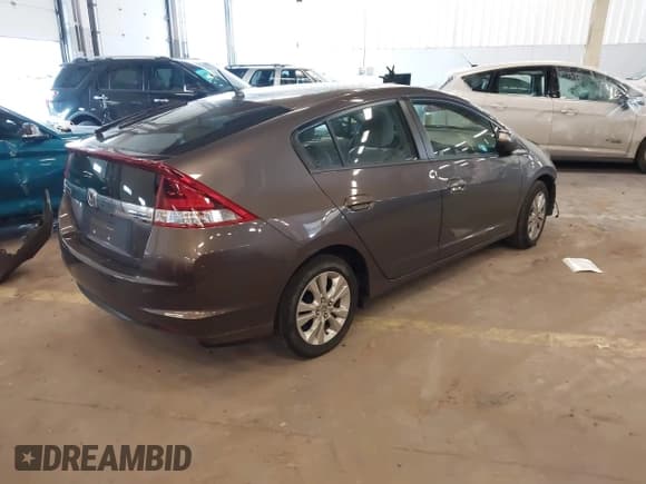 ✅ 2012 Honda Insight EX • VIN: JHMZE2H76CS003773 • Lot: 41926342. Listed on IAAI with 73,459 mi. Free auction sales archive from the USA and detailed vehicle history report at DreamBid. Image 4.