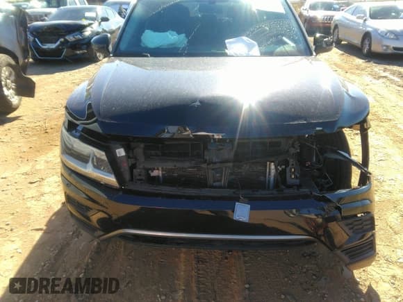 ✅ 2018 Volkswagen Tiguan SEL • VIN: 3VV3B7AX9JM121380 • Лот: 43466460. Опубликован ранее на IAAI с пробегом 165 516 миль. Бесплатный доступ к архиву аукционных продаж из США и подробный отчёт об истории автомобиля на DreamBid. Изображение 6.