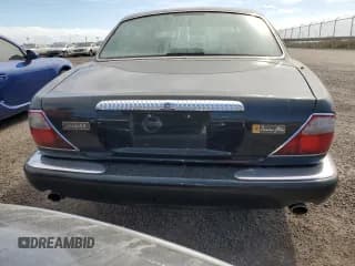 ✅ 1999 Jaguar XJ • VIN: SAJKX6047XC861227 • Lot: 75007414. Wystawiony na Copart z przebiegiem Nie podano. Bezpłatny archiwum sprzedaży aukcyjnych z USA i szczegółowy raport historii pojazdu na DreamBid. Zdjęcie 6.