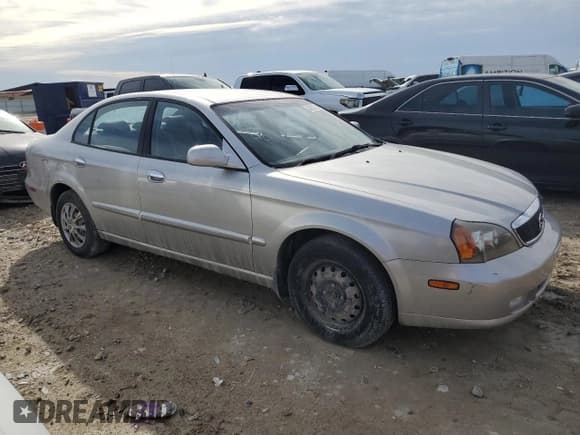 ✅ 2004 Suzuki Verona • VIN: KL5VJ52L74B100782 • Lot: 47201735. Wystawiony na Copart z przebiegiem 78 676 mil. Bezpłatny archiwum sprzedaży aukcyjnych z USA i szczegółowy raport historii pojazdu na DreamBid. Zdjęcie 4.