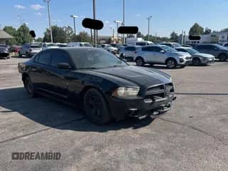 2014 Dodge Charger Police with VIN 2C3CDXATXEH237542, listed as a Copart auction lot 85778195 with 121,424 mi miles and Clean title. Bid and sale history available at DreamBid. Image 1.