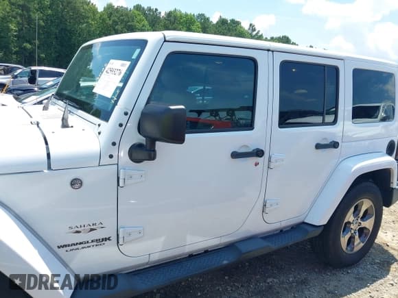 ✅ 2018 Jeep Wrangler Unlimited Sahara • VIN: 1C4BJWEG3JL805263 • Lot: 42593276. Listed on IAAI with 96,489 mi. Free auction sales archive from the USA and detailed vehicle history report at DreamBid. Image 14.