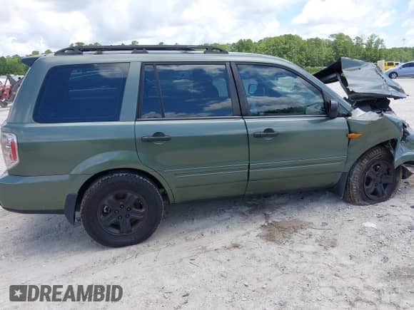 2007 Honda Pilot LX with VIN 5FNYF28167B023921, listed as a IAAI auction lot 42727822 with 177,088 mi miles and . Bid and sale history available at DreamBid. Image 13.