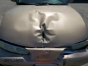 ✅ 1999 Oldsmobile Alero GL • VIN: 1G3NL52E8XC303961 • Lot: 65962434. Wystawiony na Copart z przebiegiem 160 336 mil. Bezpłatny archiwum sprzedaży aukcyjnych z USA i szczegółowy raport historii pojazdu na DreamBid. Zdjęcie 13.