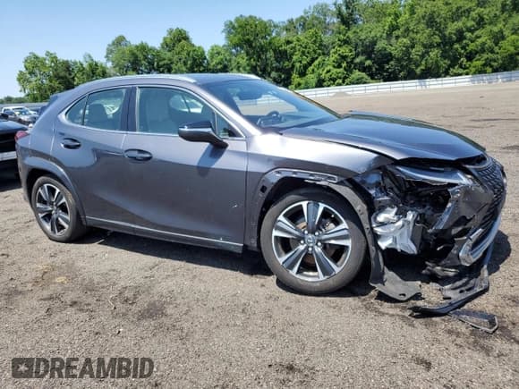 ✅ 2023 Lexus UX 250h Premium • VIN: JTHP9JBH8P2069660 • Lot: 61644545. Listed on Copart with 42,888 mi. Free auction sales archive from the USA and detailed vehicle history report at DreamBid. Image 4.