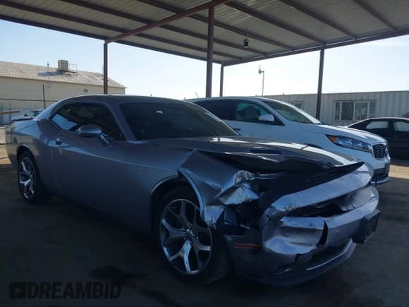 ✅ 2015 Dodge Challenger SXT Plus • VIN: 2C3CDZBGXFH700231 • Lot: 43407846. Wystawiony na IAAI z przebiegiem 129 305 mil. Bezpłatny archiwum sprzedaży aukcyjnych z USA i szczegółowy raport historii pojazdu na DreamBid. Zdjęcie 1.