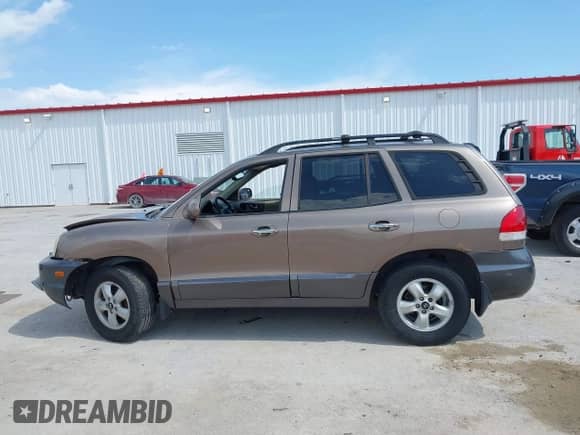 2005 Hyundai Santa Fe GLS z VIN KM8SC73E75U938928, wystawiony jako IAAI lot #42298752 z przebiegiem 147 476 mil mil oraz . Historia ofert i sprzedaży dostępna na DreamBid. Obrazek 14.
