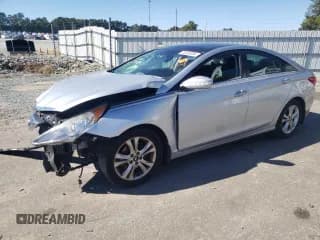 ✅ 2013 Hyundai Sonata SE • VIN: 5NPEC4AC0DH541118 • Lot: 75230094. Listed on Copart with 129,401 mi. Free auction sales archive from the USA and detailed vehicle history report at DreamBid. Image 1.