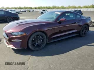 2018 Ford Mustang GT с VIN 1FA6P8CF9J5130065, выставлен на аукционе Copart как лот 89886625 с пробегом 13 094 миль миль и Списание • Salvage title. История ставок и продаж доступна на DreamBid. Изображение 1.