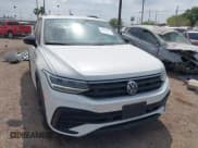 ✅ 2024 Volkswagen Tiguan SE R-Line Black • VIN: 3VVCB7AX5RM053896 • Lot: 41883670. Listed on IAAI with 11,239 mi. Free auction sales archive from the USA and detailed vehicle history report at DreamBid. Image 1.