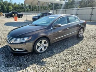 ✅ 2015 Volkswagen CC Sport • VIN: WVWBN7AN0FE810849 • Лот: 70346905. Опубликован ранее на Copart с пробегом 74 040 миль. Бесплатный доступ к архиву аукционных продаж из США и подробный отчёт об истории автомобиля на DreamBid. Изображение 1.