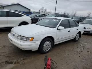 ✅ 1993 Ford Taurus GL • VIN: 1FALP5246PG287289 • Lot: 86996384. Listed on Copart with 69,926 mi. Free auction sales archive from the USA and detailed vehicle history report at DreamBid. Image 1.