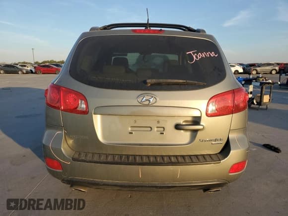 ✅ 2009 Hyundai Santa Fe Limited • VIN: 5NMSH73E39H255918 • Lot: 77794604. Listed on Copart with 136,174 mi. Free auction sales archive from the USA and detailed vehicle history report at DreamBid. Image 6.