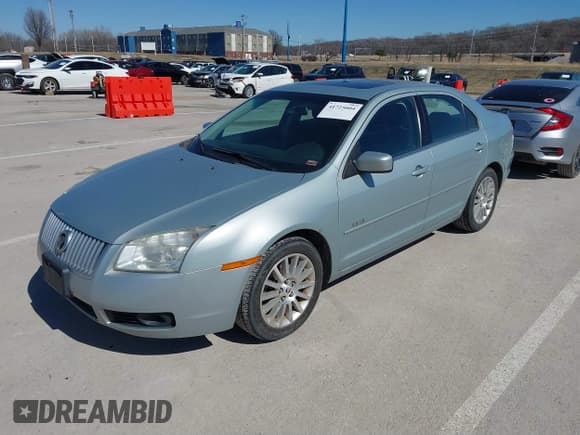✅ 2007 Mercury Milan Premier • VIN: 3MEHM08147R620038 • Lot: 41725004. Listed on IAAI with 142,983 mi. Free auction sales archive from the USA and detailed vehicle history report at DreamBid. Image 2.