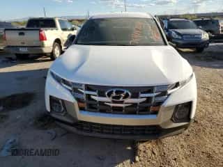 2024 Hyundai Santa Cruz SEL z VIN 5NTJB4DE8RH113577, wystawiony jako Copart lot #76414904 z przebiegiem 8 927 mil mil oraz Szkoda całkowita • Salvage title. Historia ofert i sprzedaży dostępna na DreamBid. Obrazek 5.