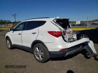 ✅ 2014 Hyundai Santa Fe • VIN: 5XYZUDLAXEG190334 • Лот: 85566705. Опубликован ранее на Copart с пробегом 186 994 миль. Бесплатный доступ к архиву аукционных продаж из США и подробный отчёт об истории автомобиля на DreamBid. Изображение 2.