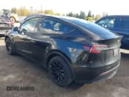 ✅ 2023 Tesla Model Y Long Range • VIN: 7SAYGDEEXPF689909 • Lot: 43551907. Listed on IAAI with 57,191 mi. Free auction sales archive from the USA and detailed vehicle history report at DreamBid. Image 3.