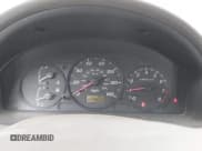 ✅ 2001 Mazda Protege LX • VIN: JM1BJ225910464299 • Lot: 42864156. Listed on IAAI with 117,926 mi. Free auction sales archive from the USA and detailed vehicle history report at DreamBid. Image 7.