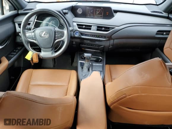 ✅ 2021 Lexus UX 250h • VIN: JTHP9JBH9M2038302 • Лот: 85597915. Опубликован ранее на Copart с пробегом 83 552 миль. Бесплатный доступ к архиву аукционных продаж из США и подробный отчёт об истории автомобиля на DreamBid. Изображение 8.