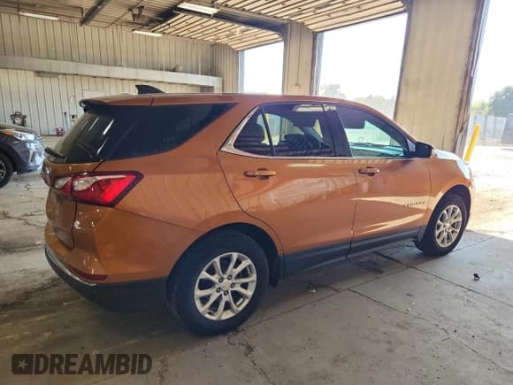 ✅ 2018 Chevrolet Equinox LT • VIN: 2GNAXJEV4J6142040 • Лот: 82235425. Опубликован ранее на Copart с пробегом 108 263 миль. Бесплатный доступ к архиву аукционных продаж из США и подробный отчёт об истории автомобиля на DreamBid. Изображение 3.