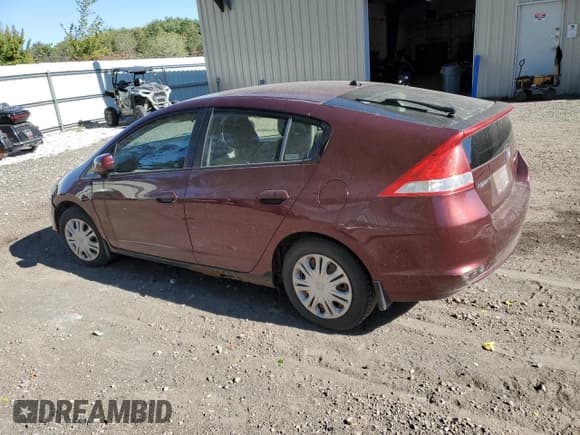 ✅ 2011 Honda Insight • VIN: JHMZE2H38BS007545 • Lot: 83764725. Listed on Copart with 133,750 mi. Free auction sales archive from the USA and detailed vehicle history report at DreamBid. Image 2.