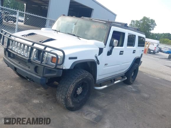 ✅ 2003 Hummer H2 • VIN: 5GRGN23U63H136857 • Lot: 42832921. Listed on IAAI with 255,833 mi. Free auction sales archive from the USA and detailed vehicle history report at DreamBid. Image 17.