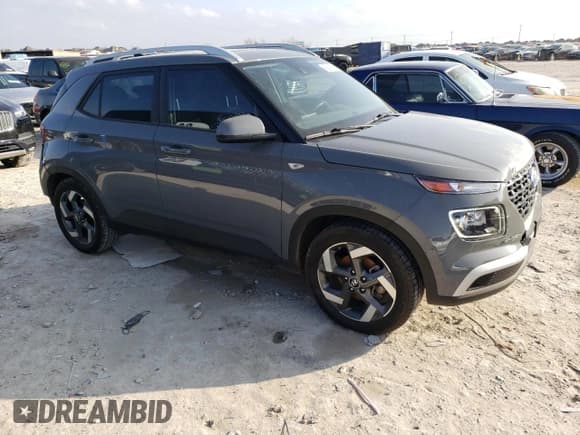 ✅ 2020 Hyundai Venue Denim • VIN: KMHRC8A38LU020415 • Lot: 43945505. Listed on Copart with 70,581 mi. Free auction sales archive from the USA and detailed vehicle history report at DreamBid. Image 4.