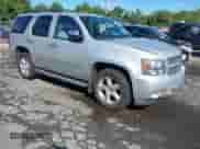 2011 Chevrolet Tahoe LTZ with VIN 1GNSKCE01BR231833, listed as a IAAI auction lot 43053303 with 247,341 mi miles and . Bid and sale history available at DreamBid. Image 1.