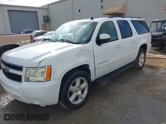 ✅ 2007 Chevrolet Suburban LTZ • VIN: 3GNFC16J47G100560 • Lot: 42432799. Listed on IAAI with 233,595 mi. Free auction sales archive from the USA and detailed vehicle history report at DreamBid. Image 2.