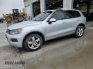 ✅ 2013 Volkswagen Touareg Exec • VIN: WVGEF9BP6DD002820 • Lot: 59322775. Listed on Copart with Not provided. Free auction sales archive from the USA and detailed vehicle history report at DreamBid. Image 1.