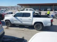 ✅ 2023 Toyota Tacoma SR5 • VIN: 3TYAZ5CN4PT042035 • Lot: 43435818. Listed on IAAI with 52,589 mi. Free auction sales archive from the USA and detailed vehicle history report at DreamBid. Image 14.