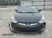 2012 Hyundai Veloster w/Red Int z VIN KMHTC6AD2CU058130, wystawiony jako Copart lot #86747414 z przebiegiem 162 982 mil mil oraz Czysty tytuł • Clean title. Historia ofert i sprzedaży dostępna na DreamBid. Obrazek 5.