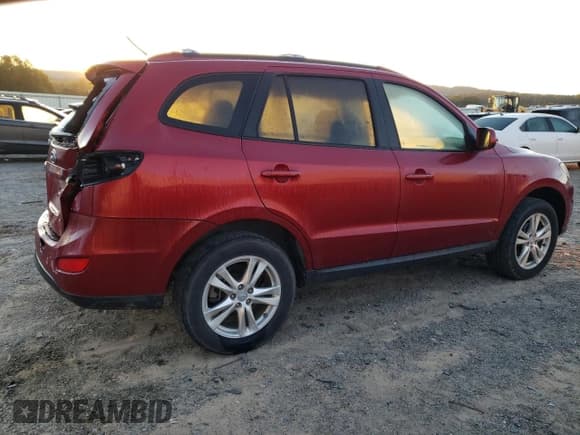 ✅ 2012 Hyundai Santa Fe SE • VIN: 5XYZHDAG9CG108036 • Lot: 75458614. Listed on Copart with 63,718 mi. Free auction sales archive from the USA and detailed vehicle history report at DreamBid. Image 3.