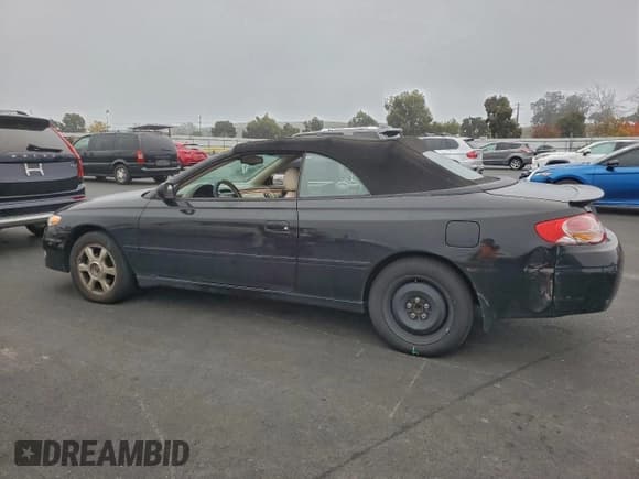 ✅ 2003 Toyota Solara SLE • VIN: 2T1FF28P23C607002 • Лот: 96213765. Опубликован ранее на Copart с пробегом 209 401 миль. Бесплатный доступ к архиву аукционных продаж из США и подробный отчёт об истории автомобиля на DreamBid. Изображение 2.