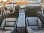 ✅ 2023 Tesla Model 3 • VIN: 5YJ3E1EA5PF596756 • Лот: 91879025. Опубликован ранее на Copart с пробегом 47 552 миль. Бесплатный доступ к архиву аукционных продаж из США и подробный отчёт об истории автомобиля на DreamBid. Изображение 8.