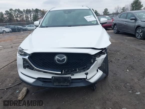 ✅ 2018 Mazda CX-5 Touring • VIN: JM3KFBCM9J0406319 • Lot: 43726839. Listed on IAAI with 50,499 mi. Free auction sales archive from the USA and detailed vehicle history report at DreamBid. Image 12.