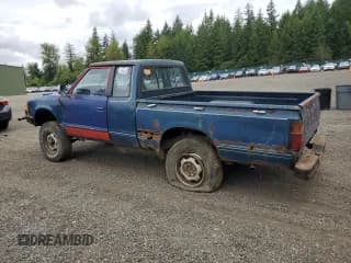 ✅ 1984 Nissan 720 • VIN: JN6ND06YXEW009894 • Лот: 61990095. Опубликован ранее на Copart с пробегом 161 176 миль. Бесплатный доступ к архиву аукционных продаж из США и подробный отчёт об истории автомобиля на DreamBid. Изображение 2.