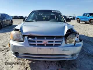 2003 Hyundai Accent with VIN KMHCF35C73U273610, listed as a Copart auction lot 85868294 with 168,203 mi miles and Salvage title. Bid and sale history available at DreamBid. Image 5.