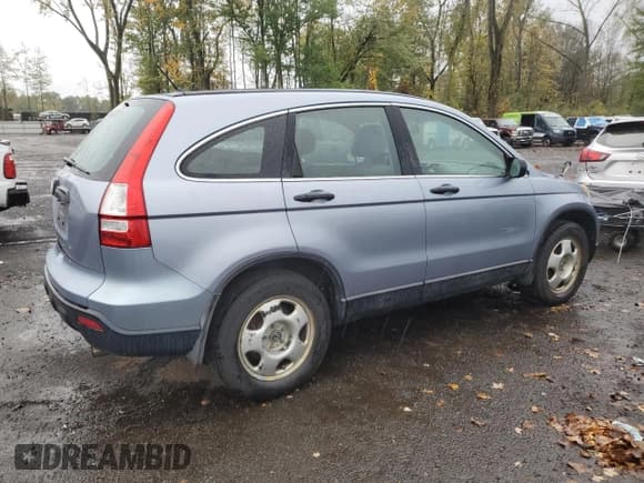 ✅ 2009 Honda CR-V LX • VIN: 5J6RE48359L034925 • Lot: 81956235. Listed on Copart with 189,656 mi. Free auction sales archive from the USA and detailed vehicle history report at DreamBid. Image 3.