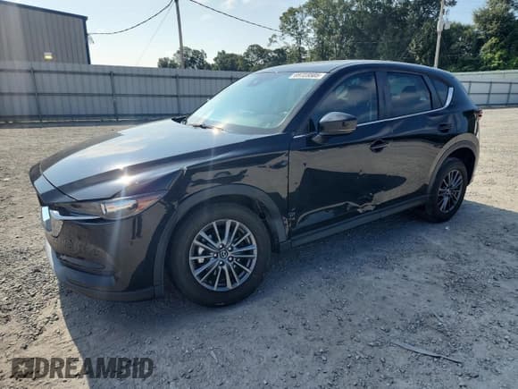 ✅ 2021 Mazda CX-5 Sport • VIN: JM3KFBBM0M1303080 • Lot: 69723505. Listed on Copart with 41,440 mi. Free auction sales archive from the USA and detailed vehicle history report at DreamBid. Image 1.